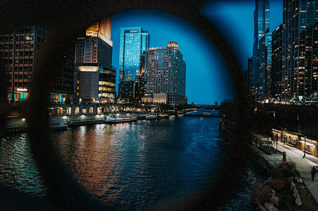 Close-up of an eye reflecting city lights symbolizing investigation