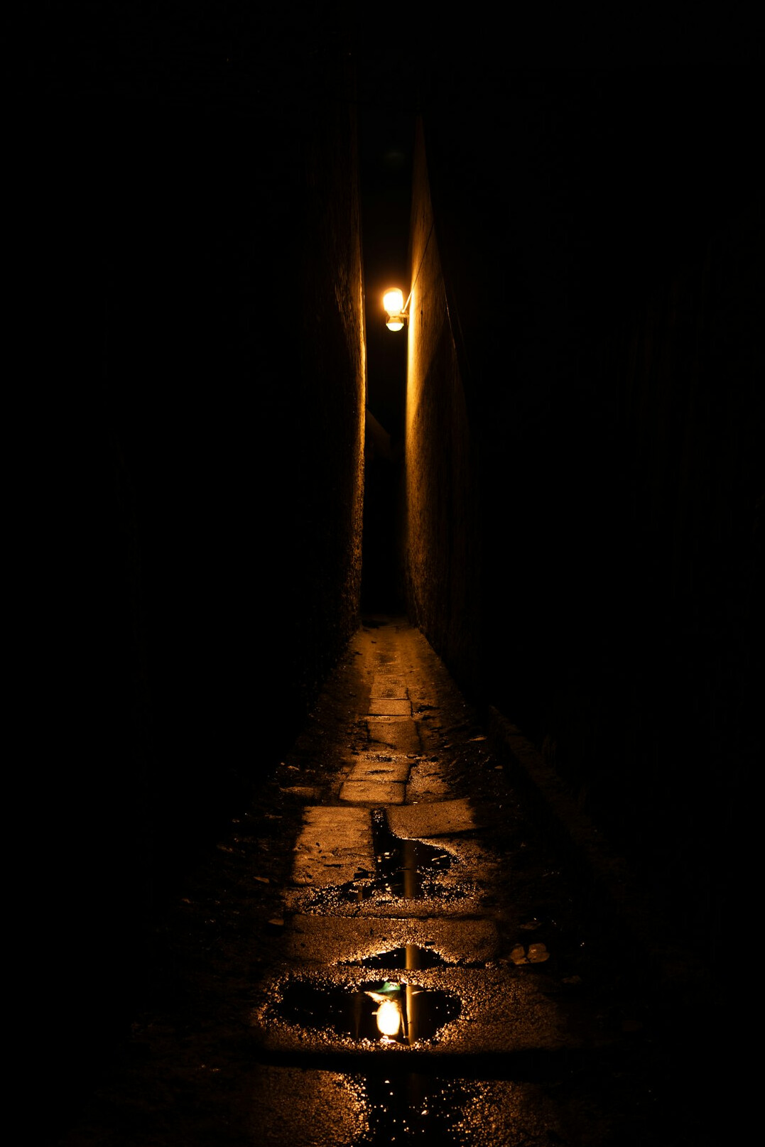 shadowy figure in dark alley