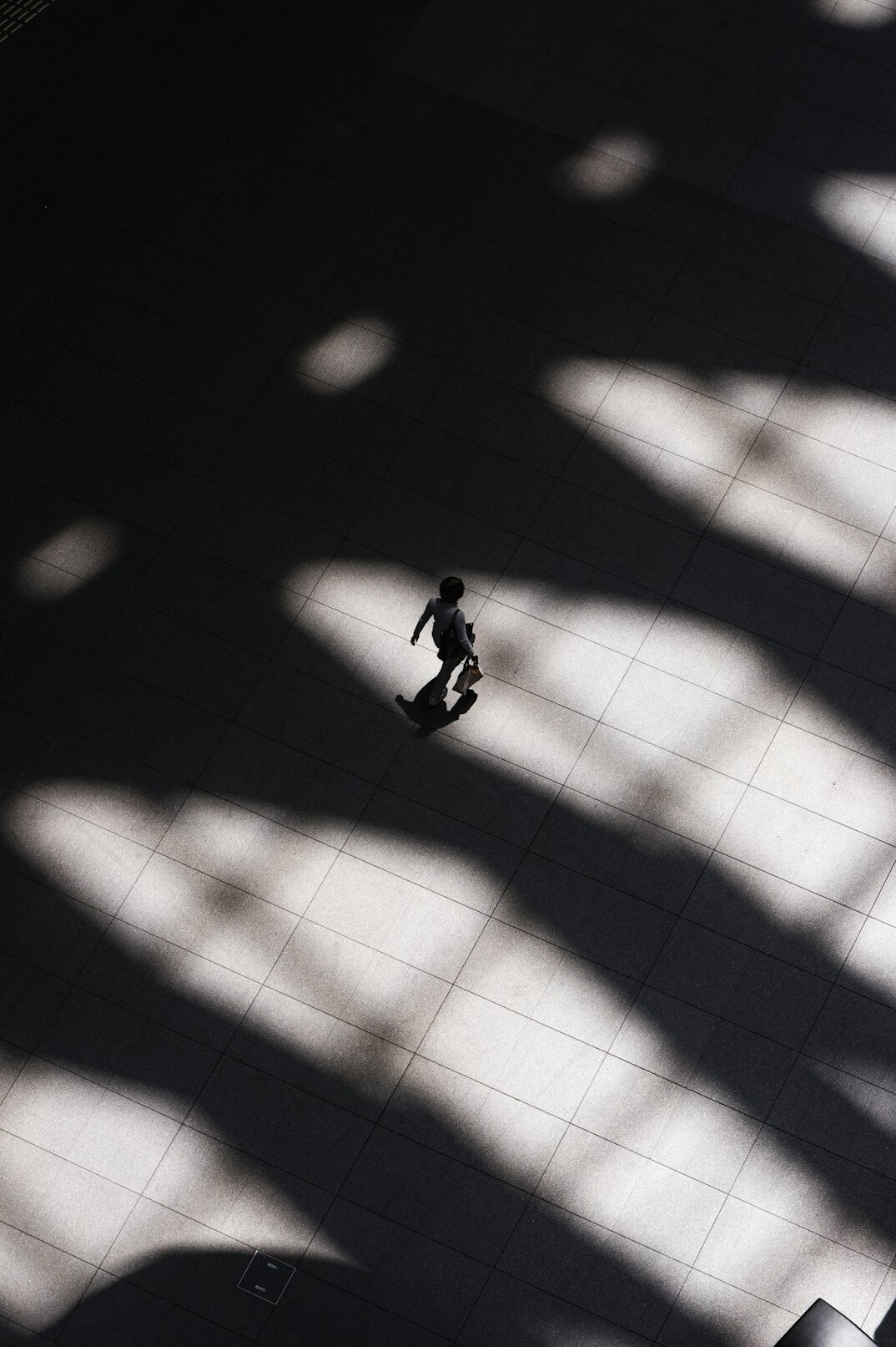 person looking into shadows
